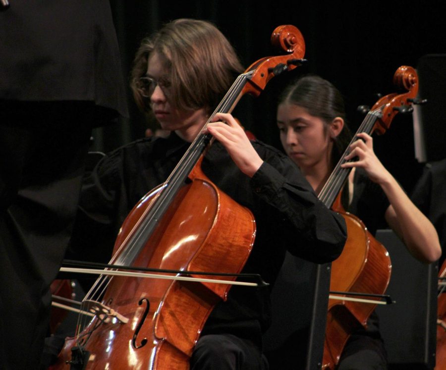 Junior Ryan Franks plays the cello at the Dec. 13 concert.