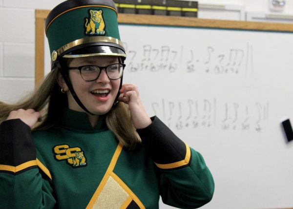 Addison Marshall ('26) trying on her new band uniform.