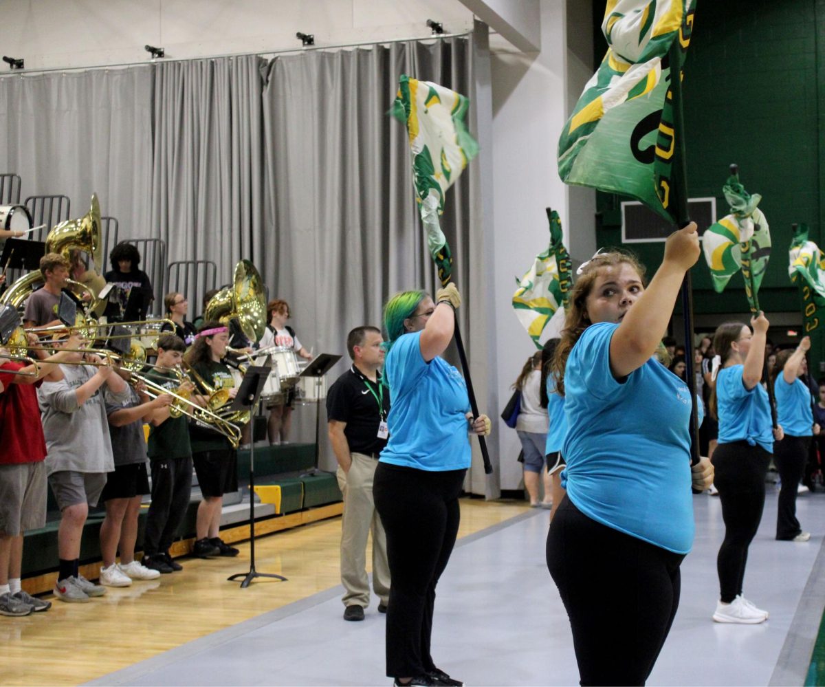 Band and color guard preforming for pep rally 