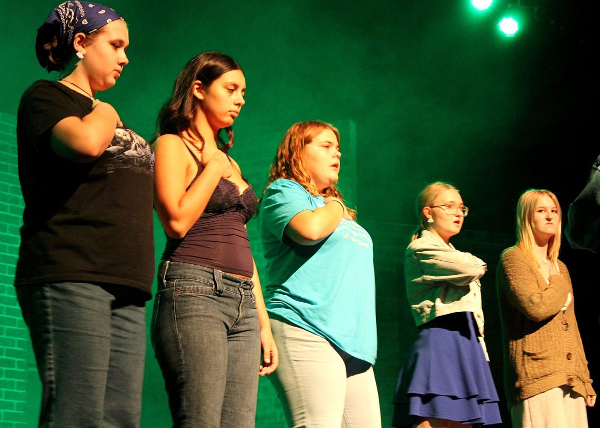 Thea Hoekstra ('28), Sarah-Lynn Russell ('28), Kayetlyn Blair ('25), Natalie Miller ('27) and Lilliana Rasmussen ('26) practice for the show. 