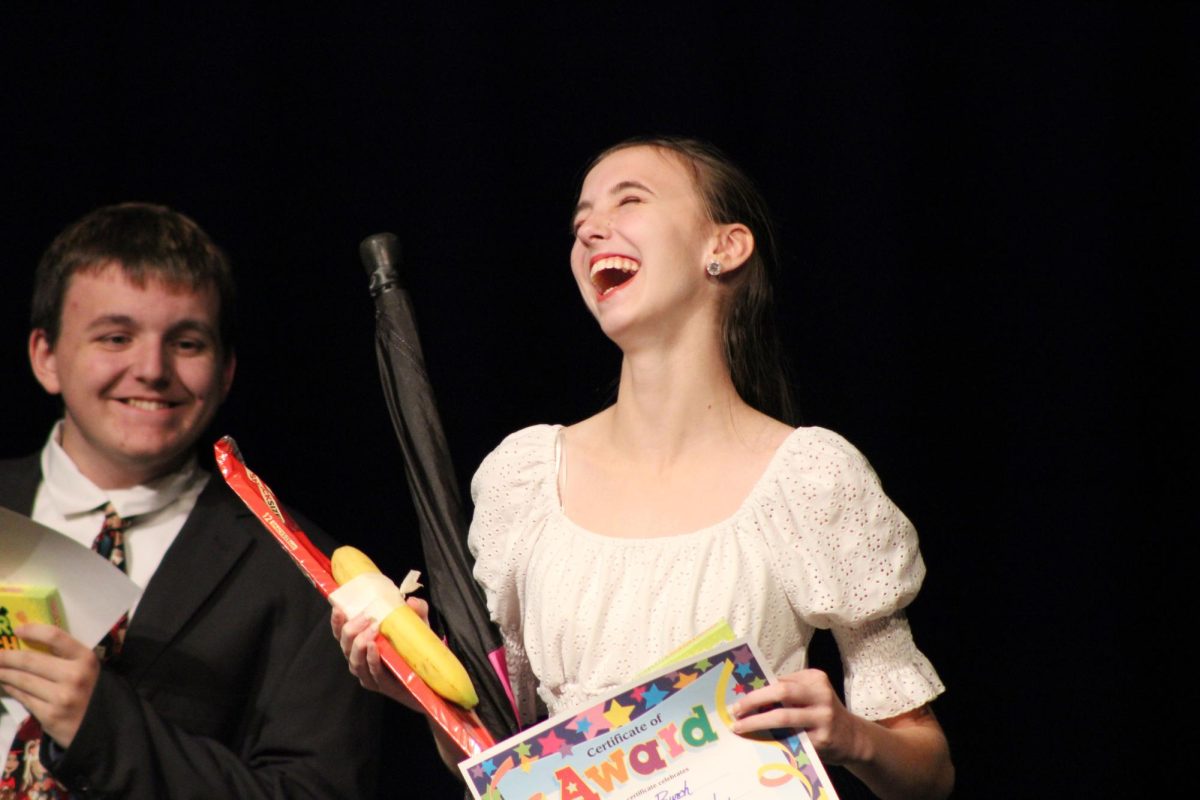 Trinity Burch ('26) wins the talent show, Lyndon Brewer ('28) is happy for her