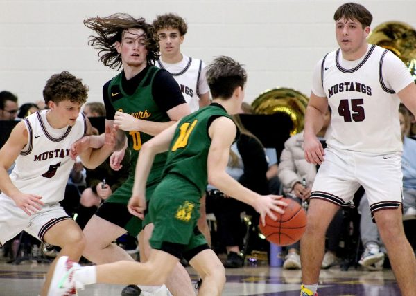 Easton Wilcox ('26) dribbles the ball.