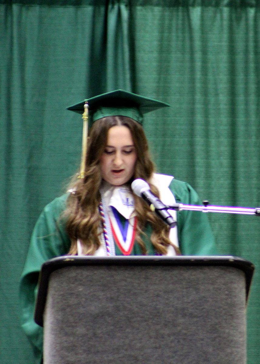 Natalie Brenneman ('25) gives the closing speech. 