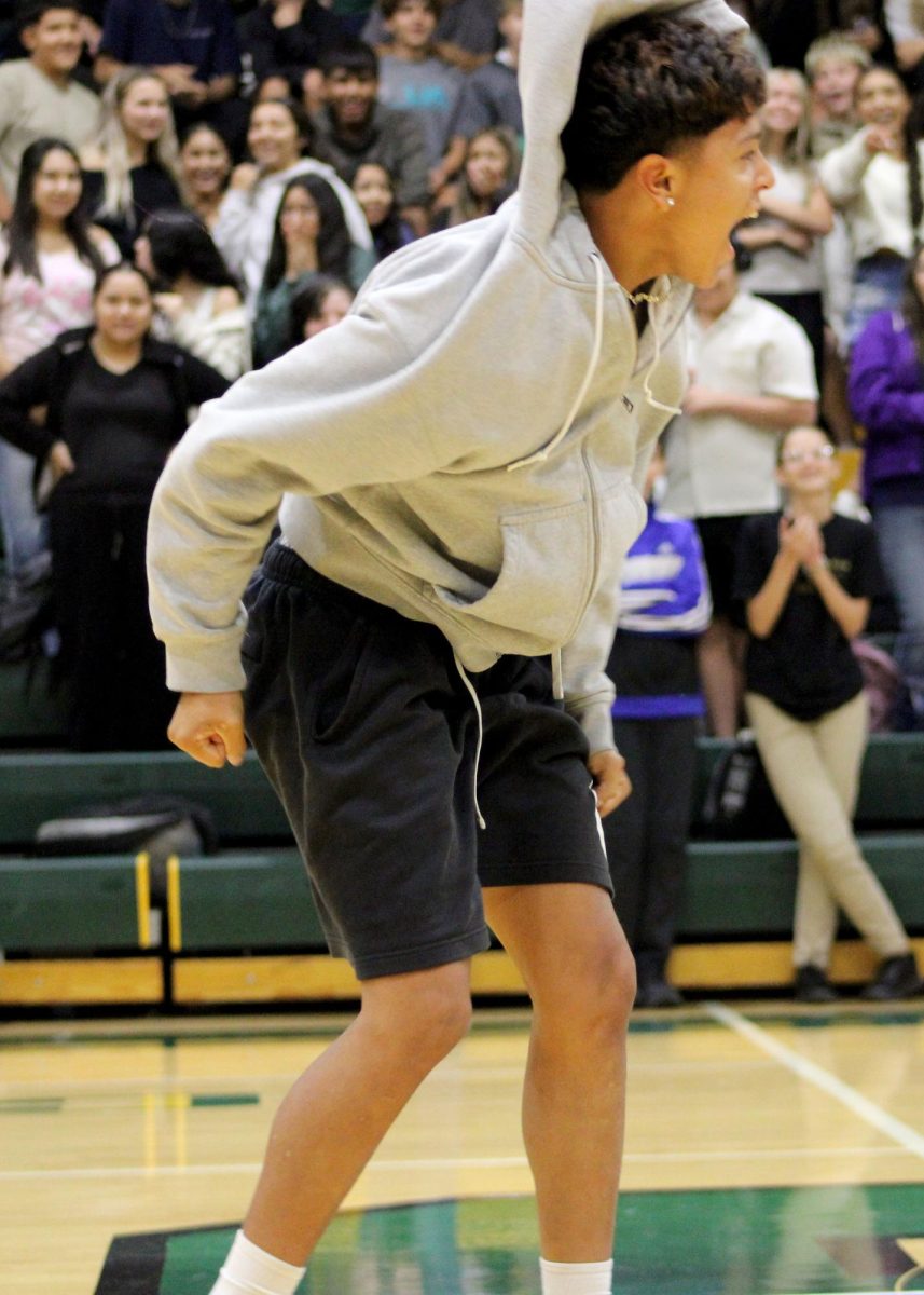 Rodrigo Palacios ('26) celebrates winning the wig game. 