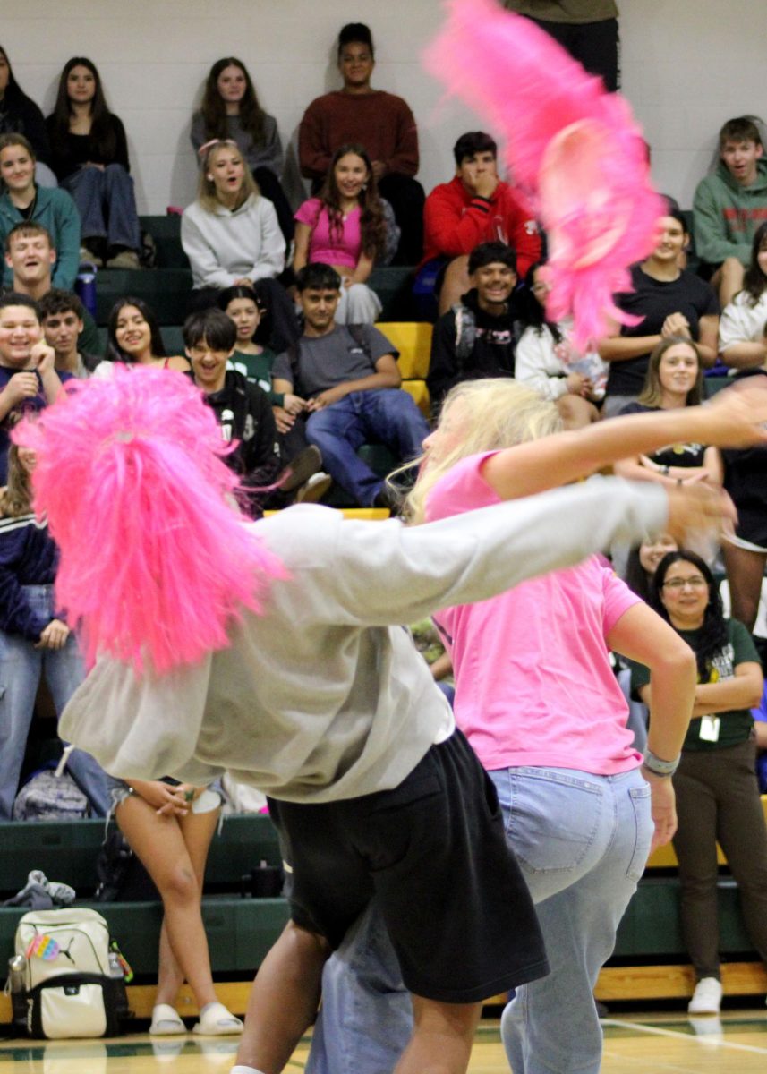 Rodrigo Palacios ('26) beats Elle Barth ('26) in the finals of the wig game. 