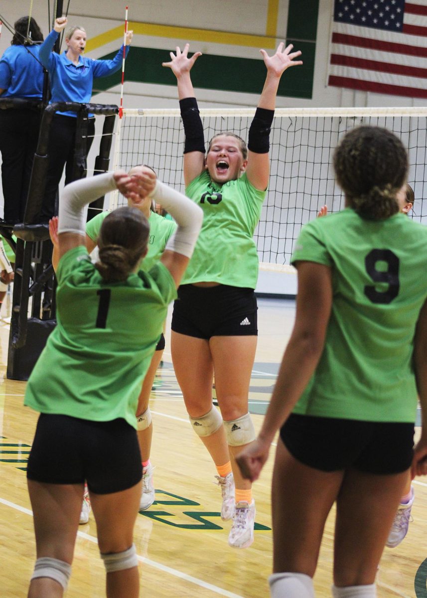 Sophie Daily ('26) jumps for joy after successfully scoring an ace