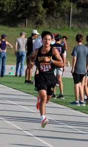 Elian Moreno ('26) gets ready to cross the finish line during the Salina Invitational on Oct. 11th.